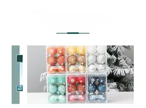 Detail view of colorful Christmas balls with glitter and snowflake patterns in gift boxes