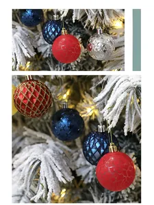 Close-up of decorative Christmas balls with ice crackle and star patterns on white cedar