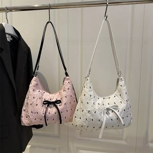 Pink and white trendy bow tote bags with textured fabric and heart pendant for women