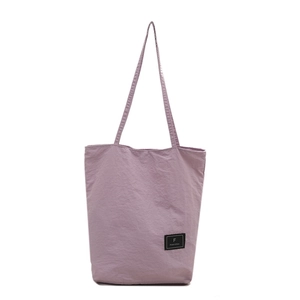 Minimalist lavender nylon tote bag with shoulder straps for women's daily commute