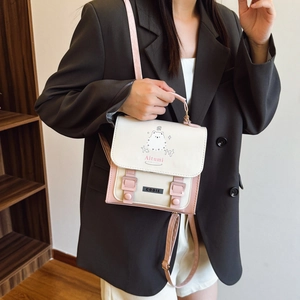 Sac à dos chic crème et rose pour femme avec illustrations de dessins animés et rabat