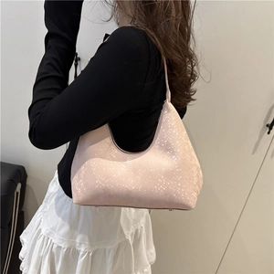 Damen Schultertasche aus rosa Leder mit Schlangenmuster in der seitlichen Ansicht