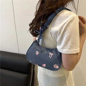 Floral denim shoulder bag with pink embroidery and ruched strap for a sweet look