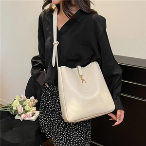 Chic cream white bucket bag with gold hardware buckle and adjustable long shoulder strap