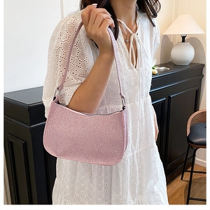 Pink sequin hobo bag for women featuring a shimmering crescent moon shape and slim strap
