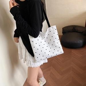 Japanese style floral canvas tote bag with white lace trim and black bow shoulder strap