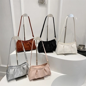 Chic pleated crossbody bags in multiple colors featuring premium crinkled texture