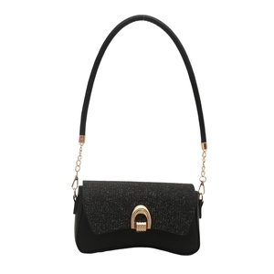 Chic black crossbody bag with silver glitter flap and gold horseshoe buckle for women