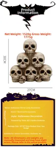 Detailed view of stacked resin skulls Halloween decor with size dimensions 30cm by 27cm