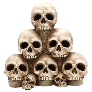 Stacked skull pile figurine with antique finish for Halloween party and haunted house decor
