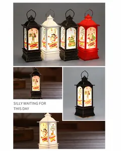 Detalle de farolillos LED navideños en cuatro colores con dibujos de Papá Noel y nieve