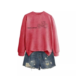 Pink Thank a Farmer long sleeve crewneck sweatshirt with denim shorts flat lay display