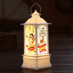 Detalle de farol navideño blanco con luz LED e ilustración festiva de muñeco de nieve