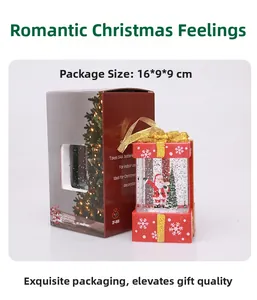 Detailed view of LED Christmas lantern with Santa scene and festive gift box packaging
