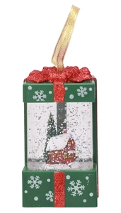 Detail of Christmas lantern with red bow and glittery snowman scene inside