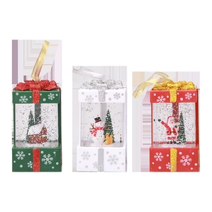 Set of three Christmas water lanterns with Santa, Snowman and Cabin figurines inside