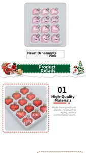 Detail of pink heart-shaped Christmas ornaments with shiny metallic finish and hanging hooks