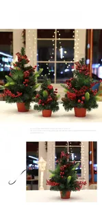 Mini tabletop Christmas trees with pine cones, red berries and plaid bows in pots