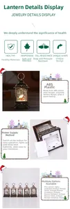 Detail van kerstlantaarn met miniatuurlandschap, de Kerstman en glinsterende effecten