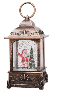 Detail of vintage bronze Christmas lantern featuring Santa Claus and glitter snowflakes