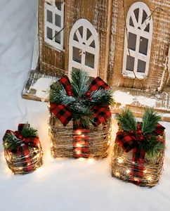 Three-piece lighted Christmas gift box set with rattan weave and warm LED lights