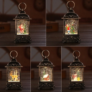 Vintage bronze Christmas lanterns featuring Santa, reindeer and snowman scenes