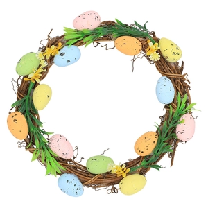Easter wreath with natural rattan base colorful foam eggs and artificial green leaves