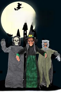 Close-up of hanging Halloween figures including a witch, skeleton, and werewolf props