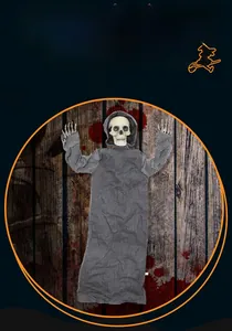 Close-up of a hanging Halloween skeleton reaper prop with a grey hooded robe and realistic bones