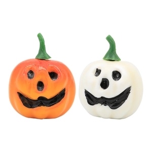 Halloween foam pumpkin decorations in orange and white with classic spooky smiley faces