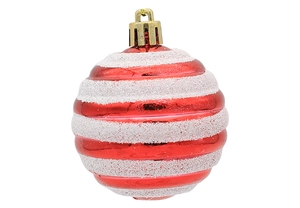 Detailed view of red and white striped Christmas ball with glitter and metallic finish