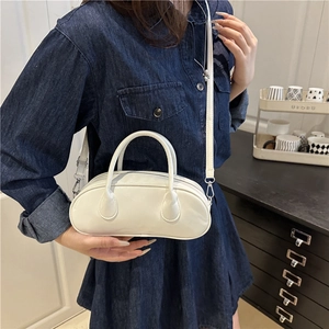 Minimalist white faux leather Boston bag with handles and adjustable shoulder strap