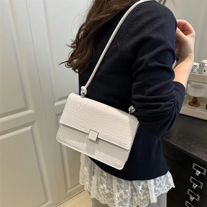 Elegant white crocodile embossed rectangular shoulder bag with classic flap and strap