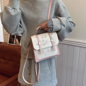 Minimalistische rosa-weiße Umhängetasche mit Cartoon-Prints und praktischem Handgriff