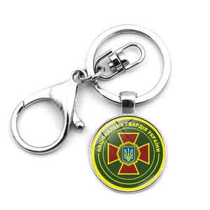 Detail of Ukraine National Guard round pendant keychain with silver metal lobster clasp