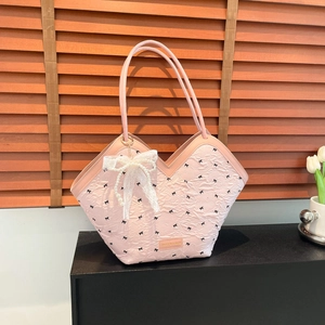 Pink pleated bucket bag with black bow prints and elegant pearl lace pendant detail