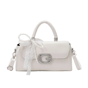 White faux leather crossbody handbag with silver G buckle and pearl bow charm