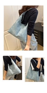 Three-way view of a large light blue tote bag with stone-washed texture for daily use