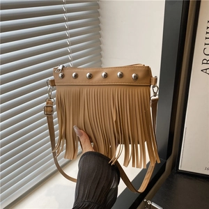 Women Tassel Rivet Crossbody Bag PU Leather Bucket Shoulder Purse Bohemian Style Adjustable Strap Fashion Daily Purse
