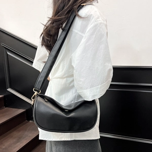 Retro black crescent crossbody bag with lychee texture and adjustable wide shoulder strap
