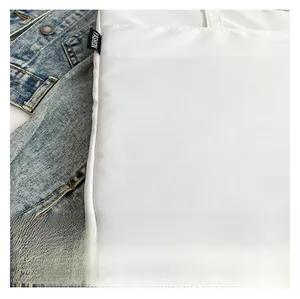 Macro shot of white scratch-resistant twill nylon fabric with black Fashion woven label