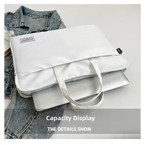 Detailed view of the large capacity interior showing a laptop inside a white nylon bag