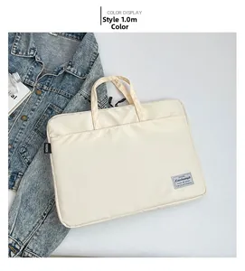 Detail of beige high-capacity tote bag featuring waterproof fabric and fashion woven label