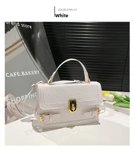 White faux-crocodile pattern handbag with gold clasp and top handle for women