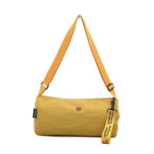 Sac bandoulière cylindrique en nylon jaune vif avec ruban et bandoulière réglable