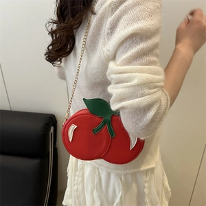 Creative cherry shaped crossbody bag in red PU leather with green leaf and gold chain
