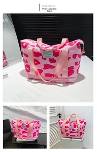 Close-up of pink leopard print fitness bag showing durable fabric and spacious interior
