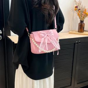 Pink bow shoulder bag with white pearl chain handle and sequin lace design for women