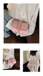 Close-up of pink square bag featuring sparkling rhinestones and a gold metal H buckle