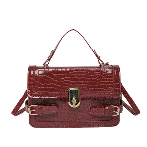 Deep red crocodile texture small square handbag with gold metallic buckle and top handle